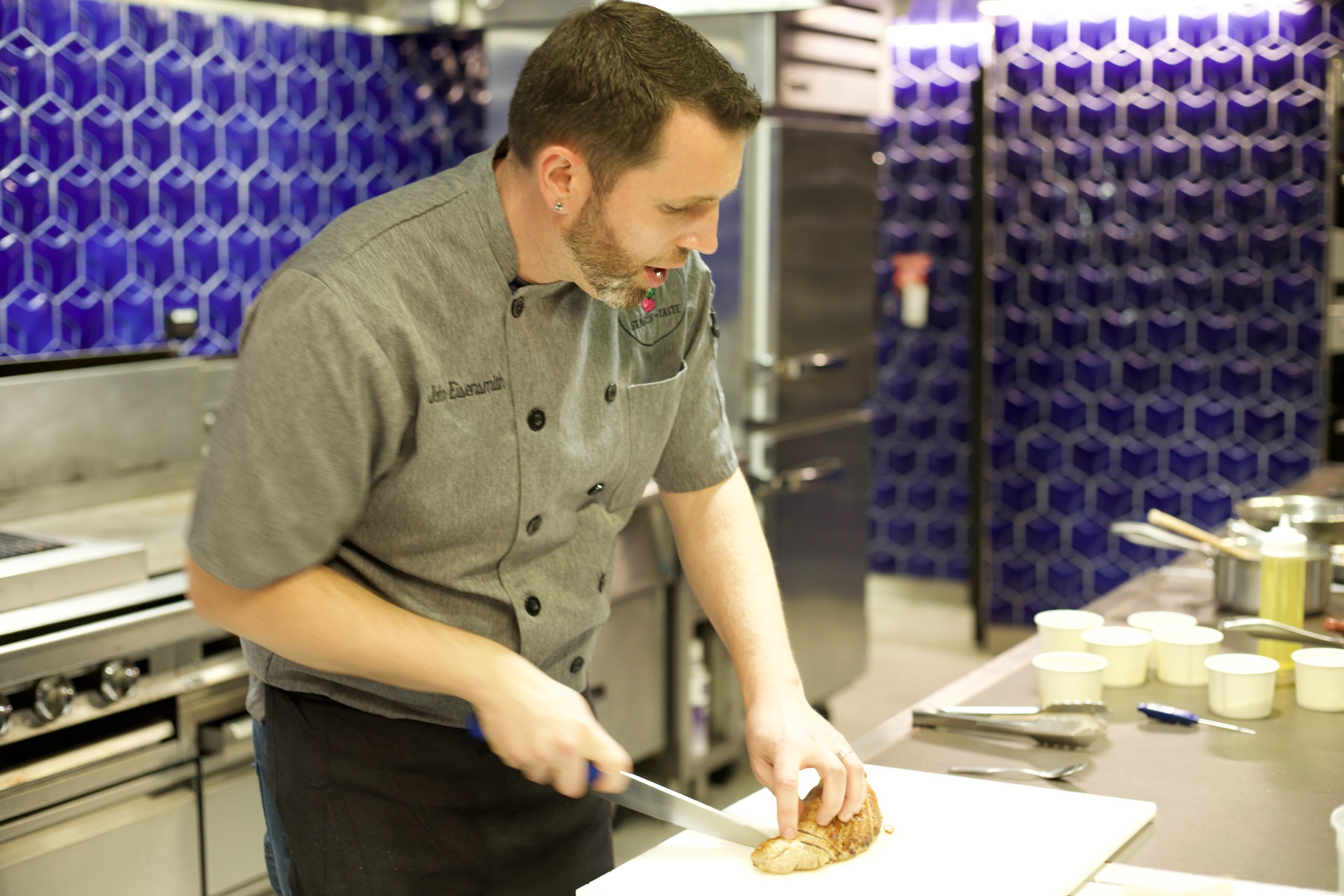 Chef preparing food at The Chef's Kitchen