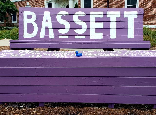 Bassett residence hall painted bench sign
